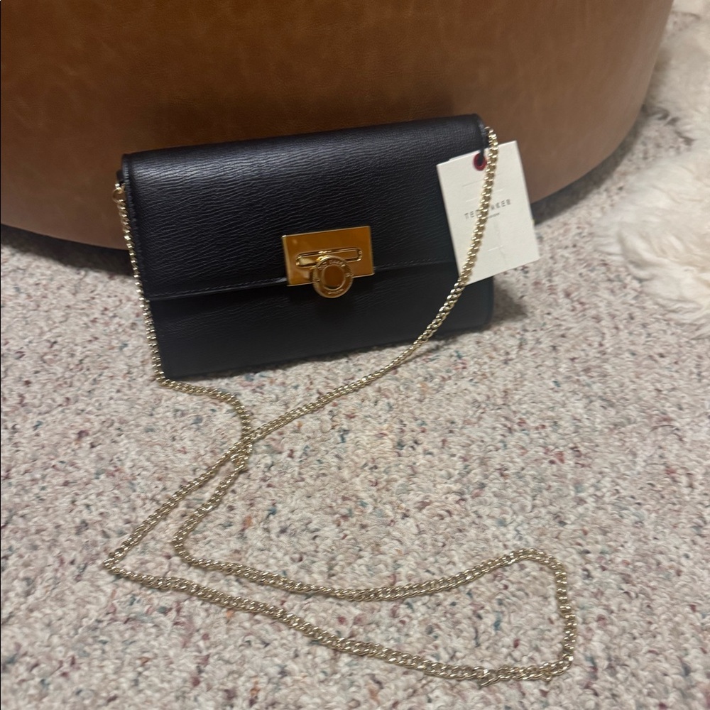 Ted Baker. Cross body bag with gold chain. New with tags.